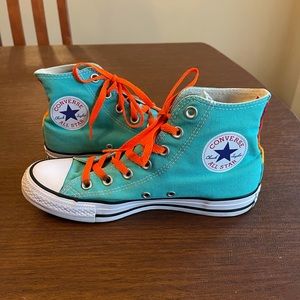 Barely worn designed high top converse
